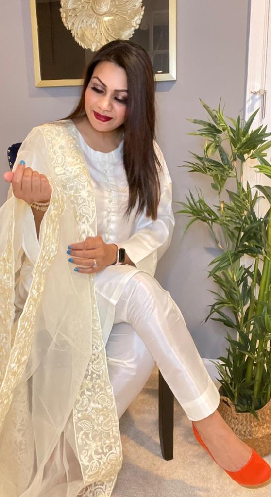 A dedicated Fashion Designer and a Coach A dedicated Fashion Designer and a Coach